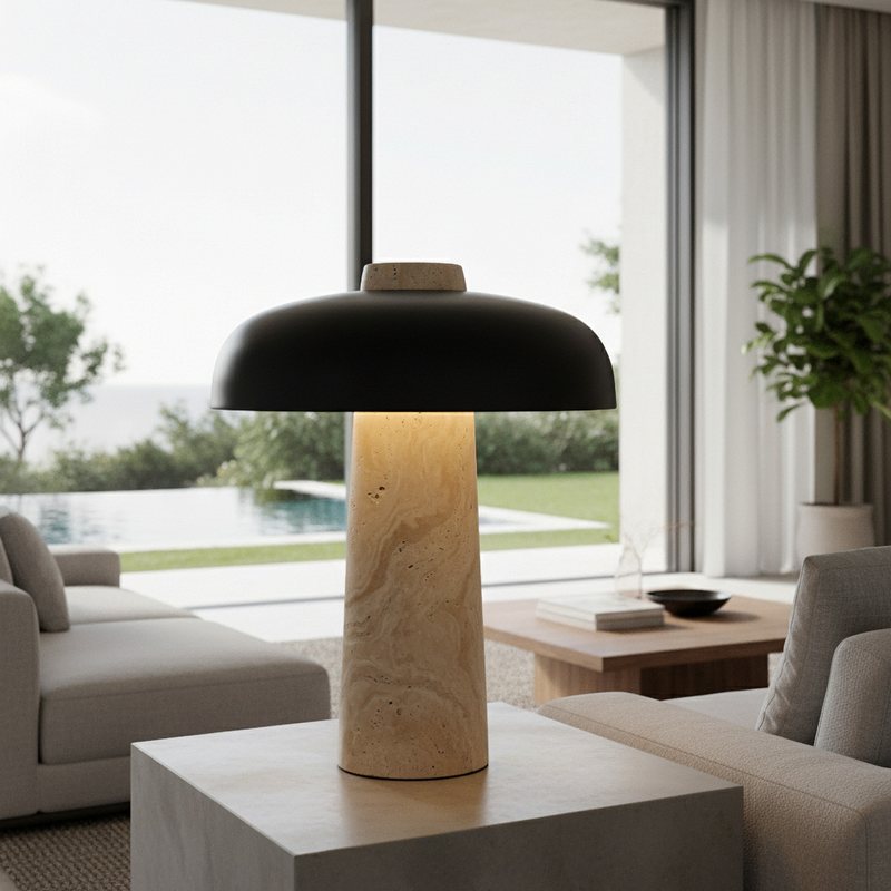Lighting: a travertine table lamp with a black shade beside a garden window